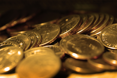 gold coins in piles